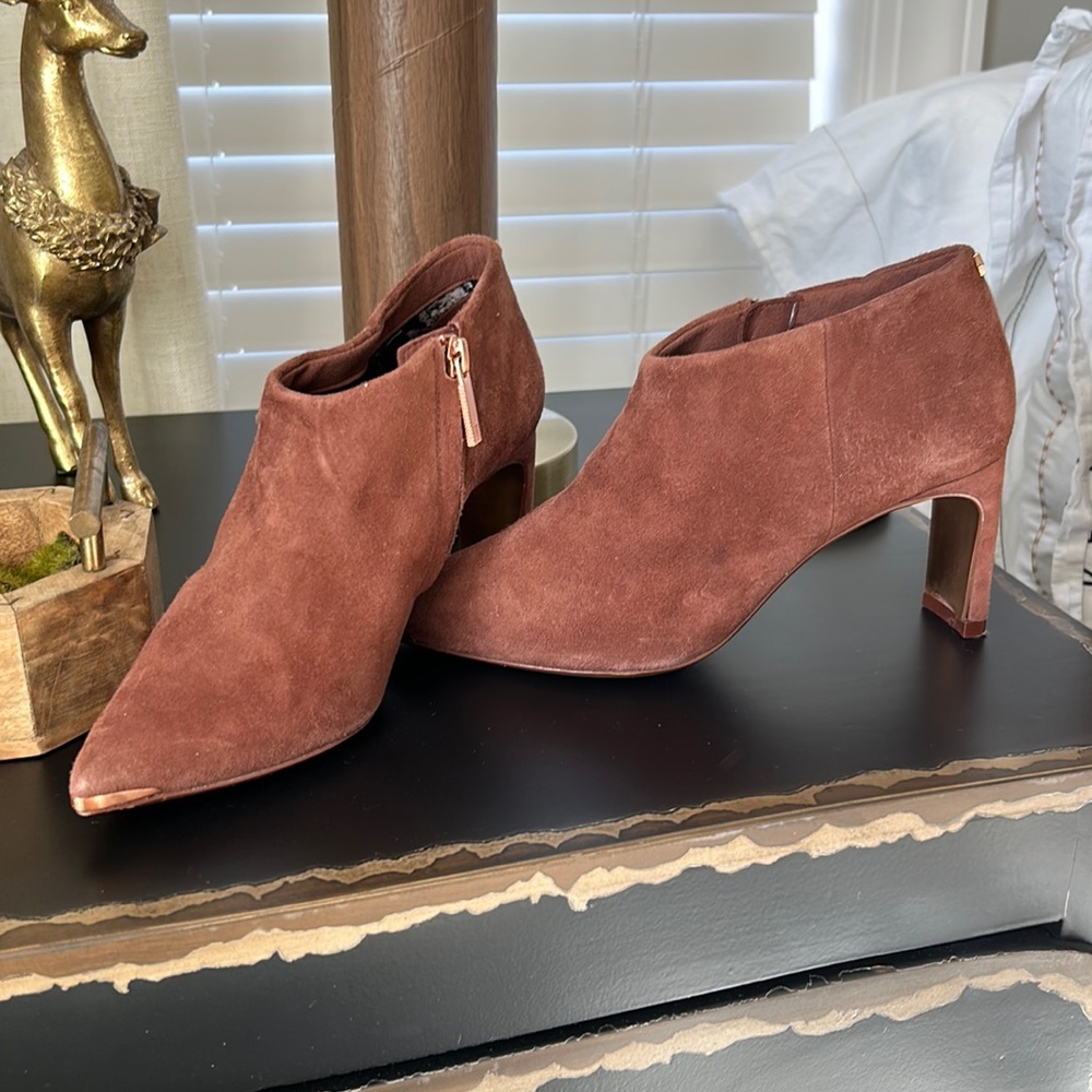Super soft suede booties. Like new only wore 2 times.